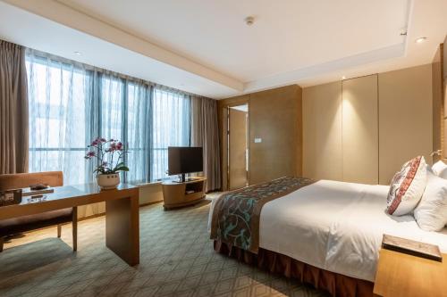 Imagen de la habitación del Hotel Xinhua Media. Foto 16