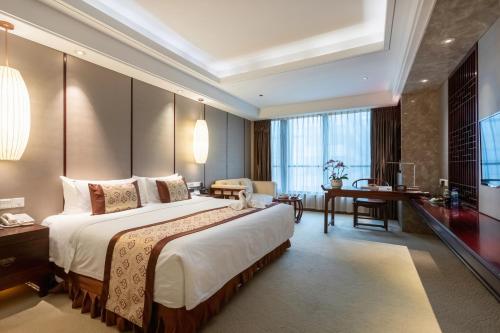 Imagen de la habitación del Hotel Xinhua Media. Foto 17