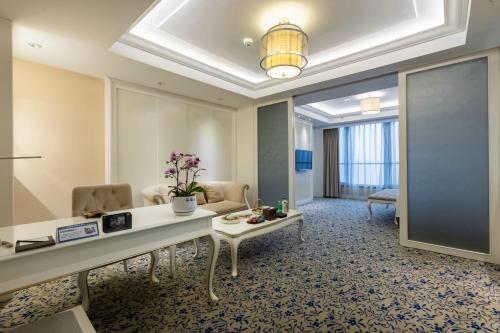 Imagen de la habitación del Hotel Xinhua Media. Foto 19