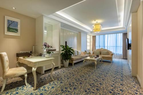 Imagen de la habitación del Hotel Xinhua Media. Foto 20