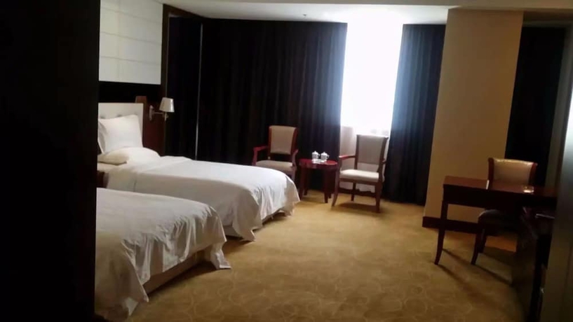 Imagen de la habitación del Hotel Xining Xibai. Foto 15