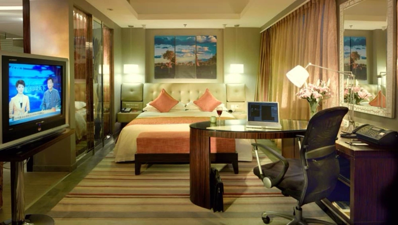 Imagen de la habitación del Hotel Xinjiang Hongfu Luxemon. Foto 15