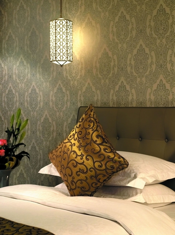 Imagen de la habitación del Hotel Xinjiang Hongfu Luxemon. Foto 17