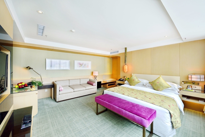 Imagen de la habitación del Hotel Xinjiang Hongfu Luxemon. Foto 18