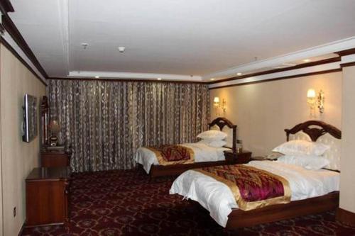 Imagen de la habitación del Hotel Xinjiang Nuerlan (formerly Name: Xinjiang Su. Foto 6