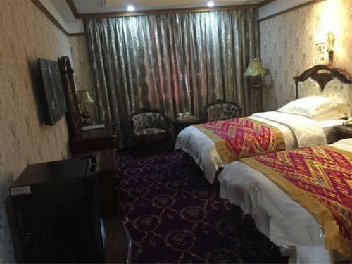 Imagen de la habitación del Hotel Xinjiang Nuerlan (formerly Name: Xinjiang Su. Foto 9