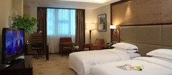 Imagen de la habitación del Hotel Xinjiang Plaza. Foto 3