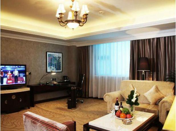 Imagen de la habitación del Hotel Xinjiang Plaza Guest Building. Foto 9