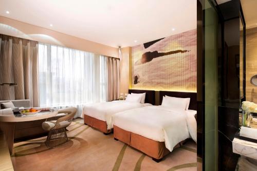 Imagen de la habitación del Hotel Xinjiang Tianyuan. Foto 6