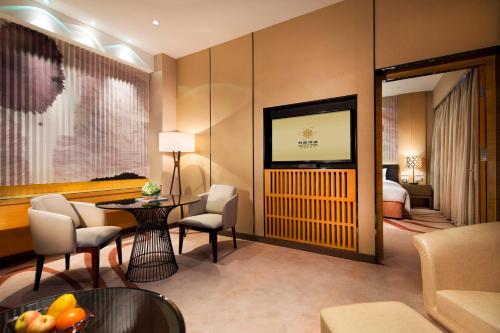 Imagen de la habitación del Hotel Xinjiang Tianyuan. Foto 7