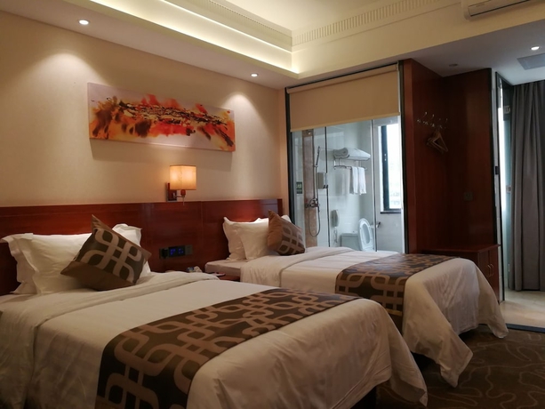 Imagen de la habitación del Hotel Xinjiayuan. Foto 2