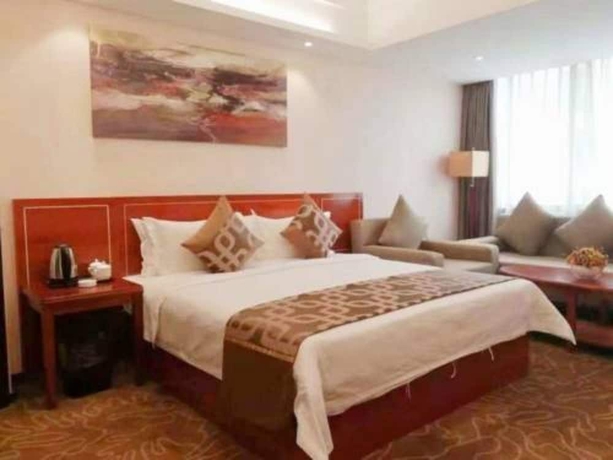 Imagen de la habitación del Hotel Xinjiayuan. Foto 3