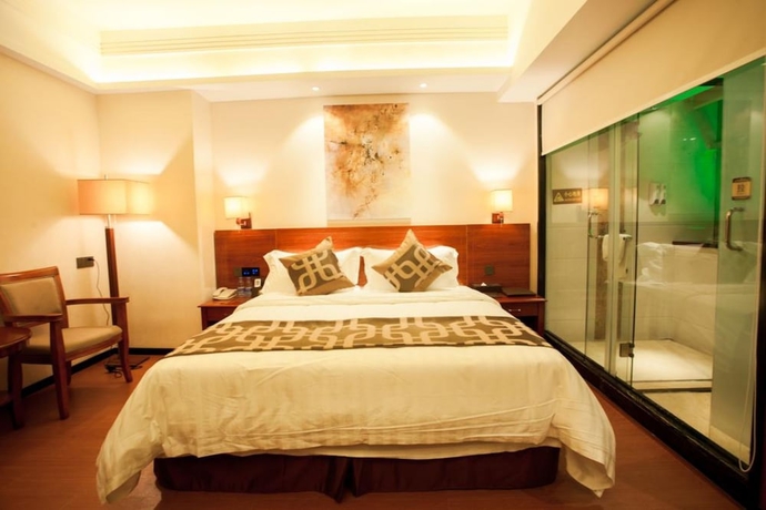 Imagen de la habitación del Hotel Xinjiayuan. Foto 4