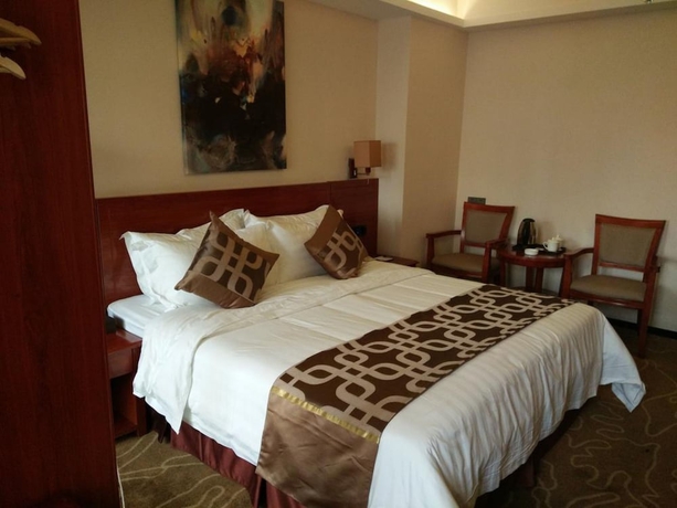 Imagen de la habitación del Hotel Xinjiayuan. Foto 7
