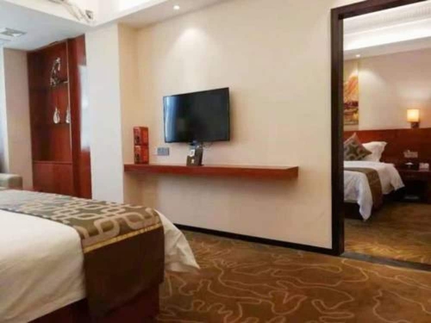 Imagen de la habitación del Hotel Xinjiayuan. Foto 8