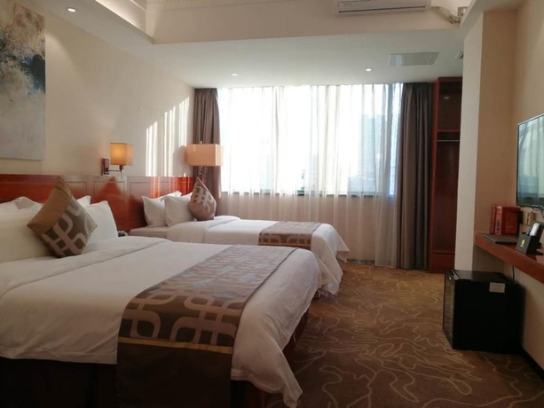 Imagen de la habitación del Hotel Xinjiayuan. Foto 9