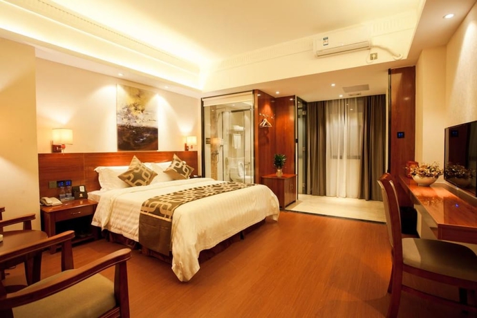 Imagen de la habitación del Hotel Xinjiayuan. Foto 10