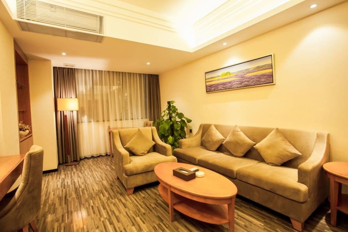 Imagen de la habitación del Hotel Xinjiayuan. Foto 12