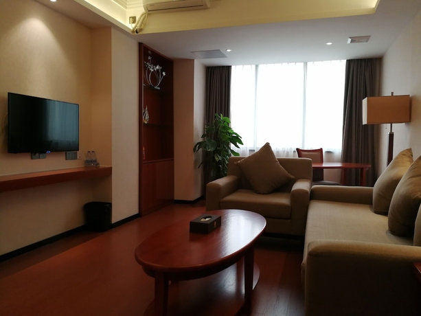 Imagen de la habitación del Hotel Xinjiayuan. Foto 13