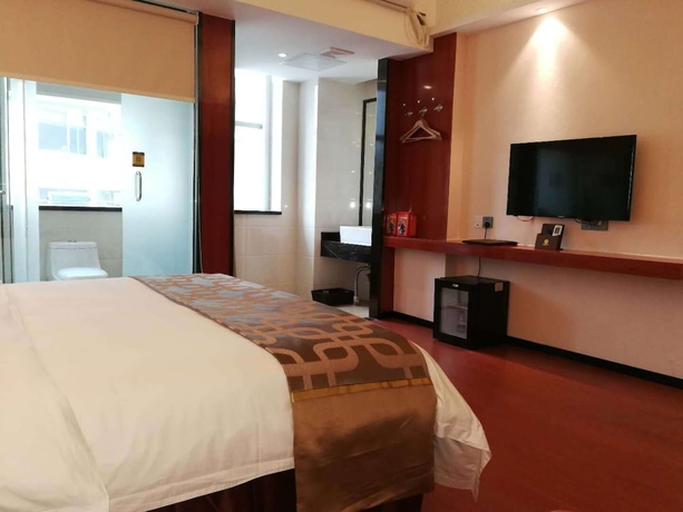 Imagen de la habitación del Hotel Xinjiayuan. Foto 16