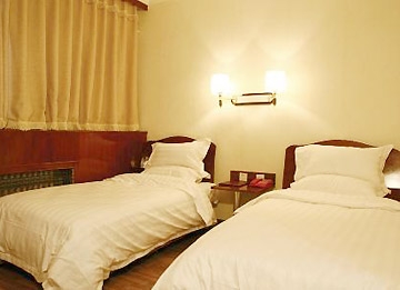 Imagen de la habitación del Hotel Xinmao Youth. Foto 2