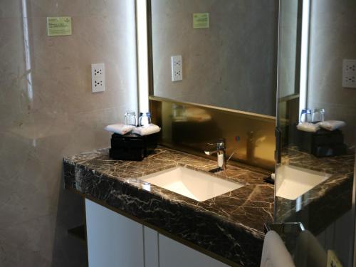 Imagen de la habitación del Hotel Xintiandi Jianguo. Foto 4