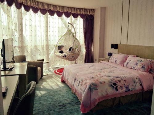 Imagen de la habitación del Hotel Xintiandi Jianguo. Foto 5