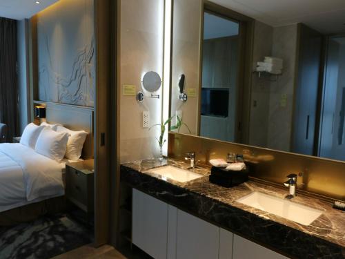 Imagen de la habitación del Hotel Xintiandi Jianguo. Foto 8