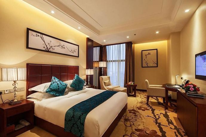 Imagen de la habitación del Hotel Xinxing Century Hotel. Foto 2