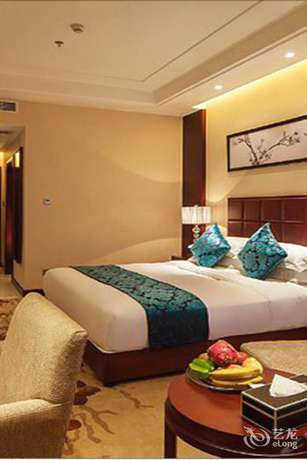 Imagen de la habitación del Hotel Xinxing Century Hotel. Foto 4