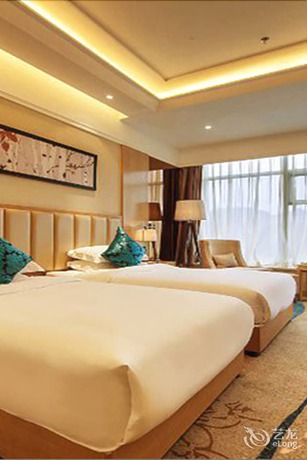 Imagen de la habitación del Hotel Xinxing Century Hotel. Foto 10