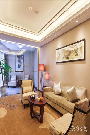 Imagen de la habitación del Hotel Xinxing Century Hotel. Foto 12