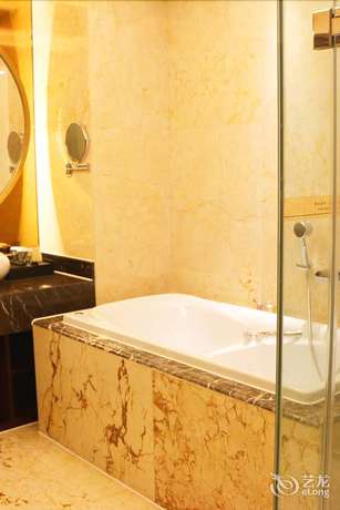 Imagen de la habitación del Hotel Xinxing Century Hotel. Foto 15