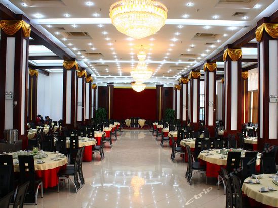 Imagen del bar/restaurante del Hotel Xinyinzhan Hot Spring Holiday. Foto 4