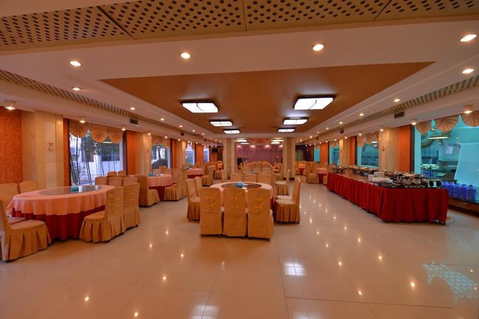 Imagen del bar/restaurante del Hotel Xinyuan Hotel - Penglai. Foto 6