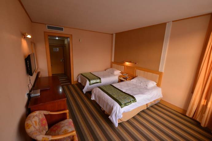 Imagen de la habitación del Hotel Xinyuan Hotel - Penglai. Foto 9