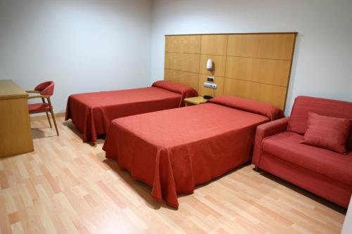 Imagen de la habitación del Hotel Xinzo. Foto 18