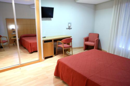 Imagen de la habitación del Hotel Xinzo. Foto 19