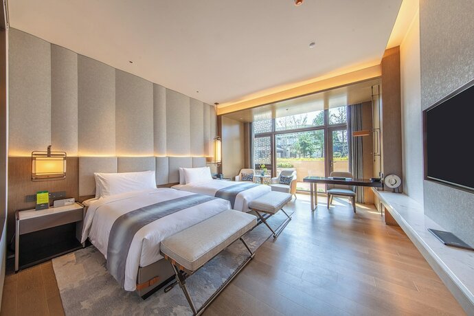 Imagen de la habitación del Hotel Xiongan International. Foto 22