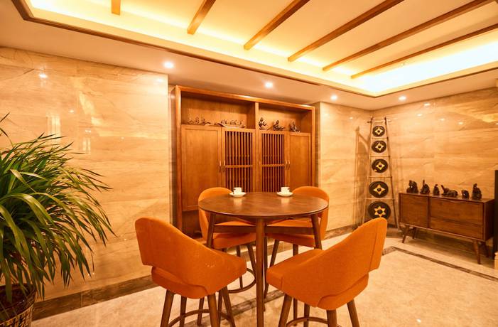 Imagen del bar/restaurante del Hotel Xishuangbana Yunshangpin. Foto 3