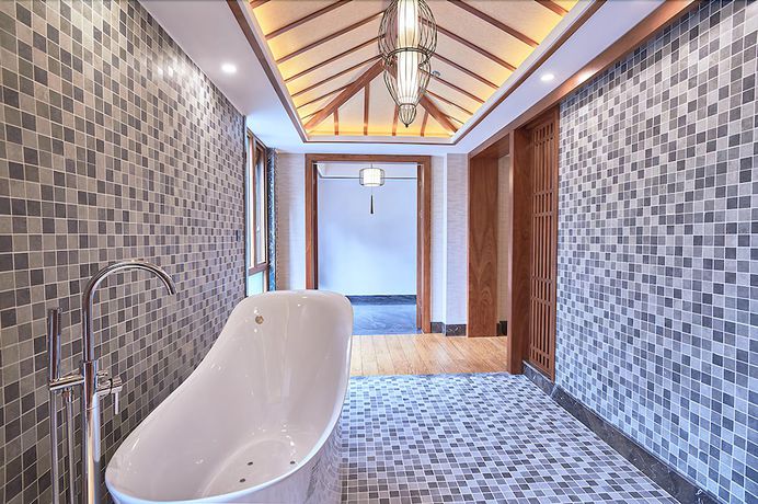 Imagen de la habitación del Hotel Xishuangbana Yunshangpin. Foto 7