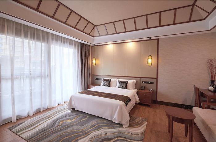 Imagen de la habitación del Hotel Xishuangbana Yunshangpin. Foto 8