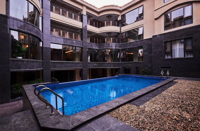 Imagen de la piscina del Hotel Xishuangbana Yunshangpin. Foto 19