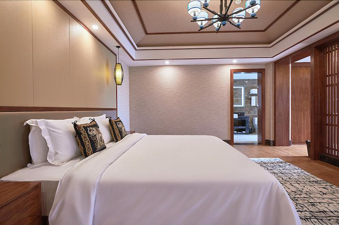 Imagen de la habitación del Hotel Xishuangbana Yunshangpin. Foto 9