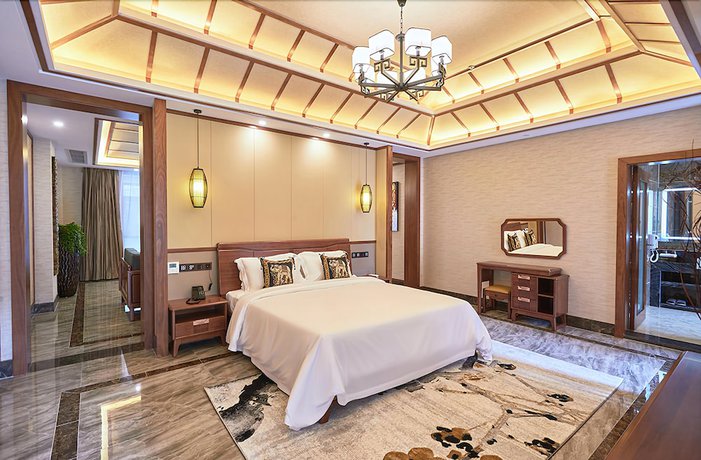Imagen de la habitación del Hotel Xishuangbana Yunshangpin. Foto 10