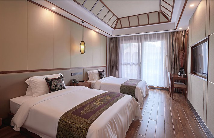 Imagen de la habitación del Hotel Xishuangbana Yunshangpin. Foto 14