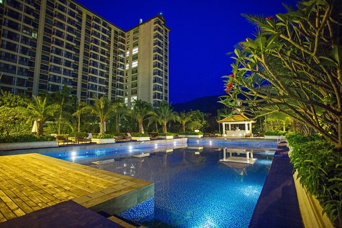 Imagen de la piscina del Hotel Xishuangbanna Yajule City Golf. Foto 15
