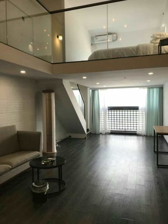 Imagen de la habitación del Hotel Xitishu Apartment. Foto 3