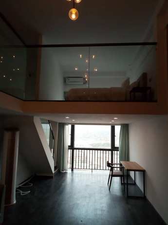 Imagen de la habitación del Hotel Xitishu Apartment. Foto 4
