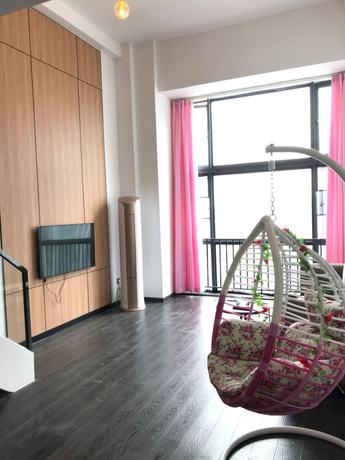 Imagen de la habitación del Hotel Xitishu Apartment. Foto 6
